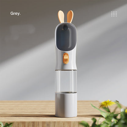 Bouteille d'eau portable pour animaux, idéale pour voyages et promenades.