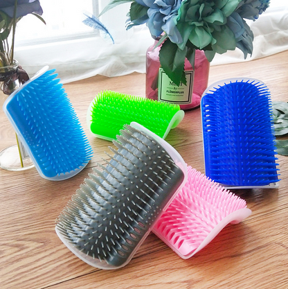 Brosse auto-toilette pour chat, massage et toilettage combinés.