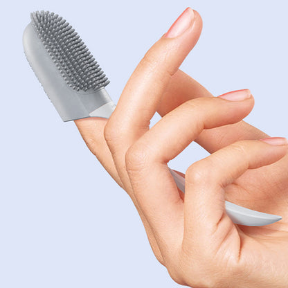 Brosse à dents en silicone pour chiens et chats, parfaite pour le brossage doux.