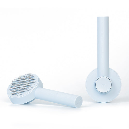 Peigne auto-nettoyant pour chiens et chats