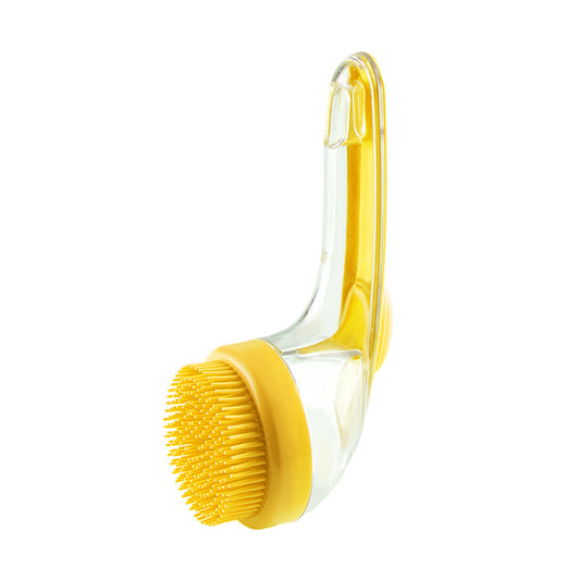 Brosse de bain ergonomique pour chiens et chats, douce et agréable au contact.